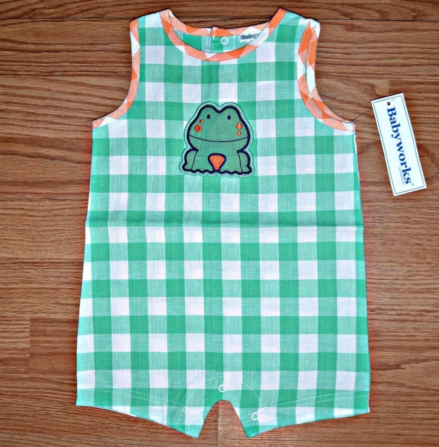Baby Works Romper with a frog motif